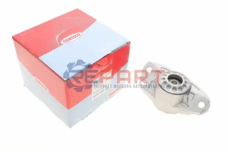Подушка амортизатора (заднього) Skoda Octavia 04-13/VW Golf V/VI 07- (овальна) CORTECO 80001560 Купити в Україні