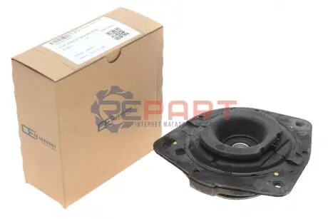 Подушка амортизатора (переднього) Nissan Micra/Renault Clio 1.4/1.5dCi/1.6 16V 03- (R) OE Germany 803023 Купити в Україні